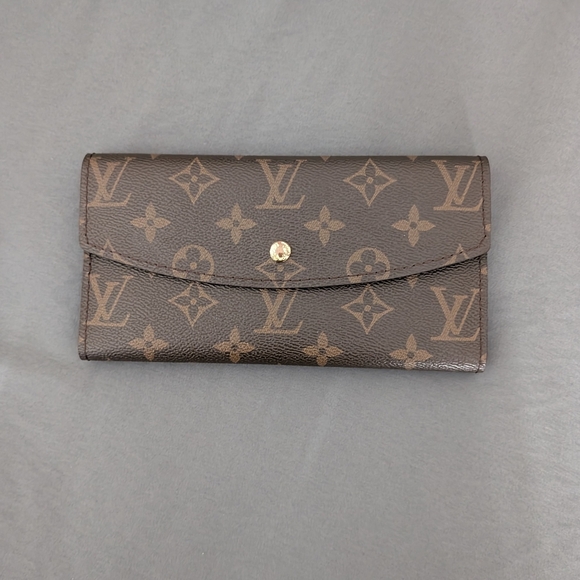 Louis Vuitton Emilie Wallet in Monogram Coated Canvas - Picture 1 of 6